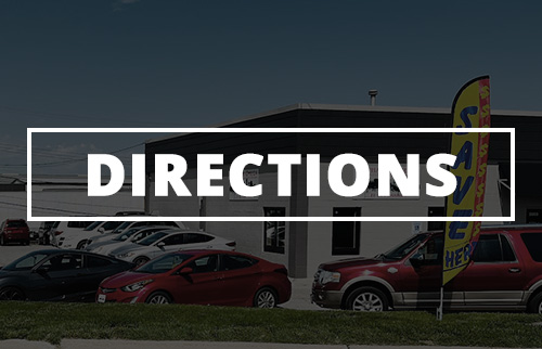 Location & hours button with store in the background.